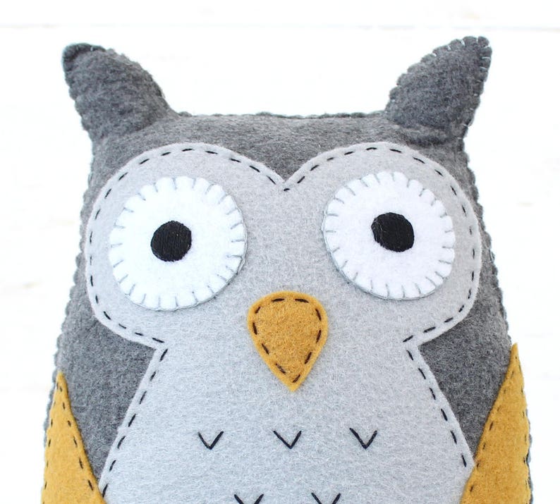 Handmade yellow and gray felt owl