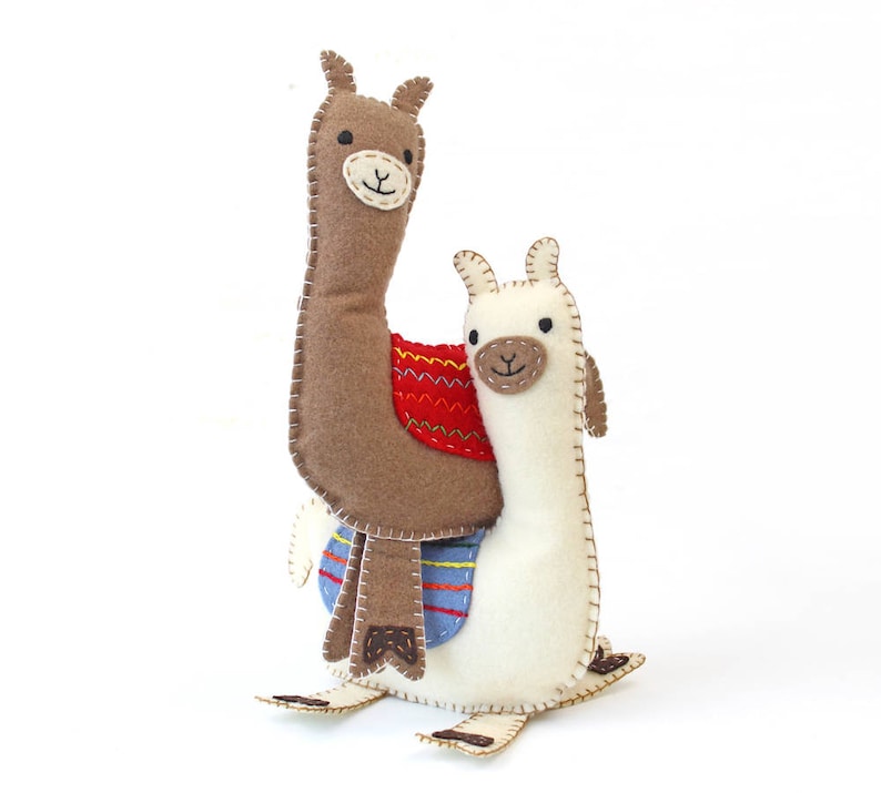 Two felt llamas stacked on one another