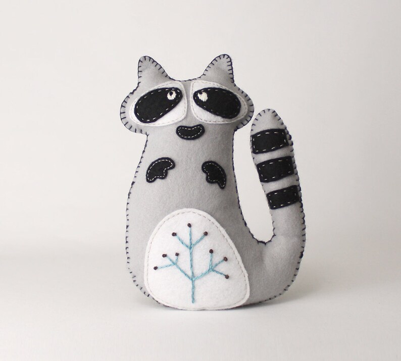 raccoon plushie