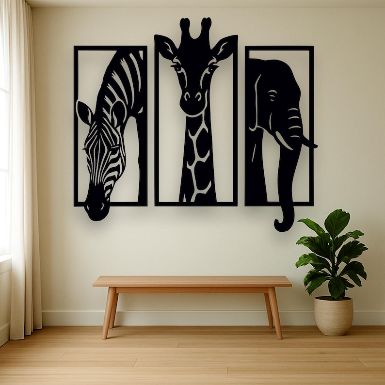 May include: Black metal wall art featuring a zebra, giraffe, and elephant, each within a rectangular frame. The artwork is mounted on a cream-colored wall above a wooden bench. A potted plant sits to the right.