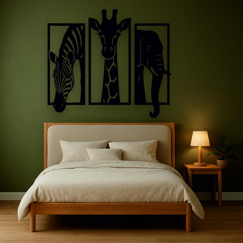 May include: Black metal wall art featuring a zebra, giraffe, and elephant, each within a rectangular frame. The artwork is mounted above a bed with a wooden frame, beige bedding, and a small side table with a lamp.