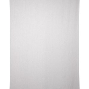 May include: A plain white backdrop for photography or videography. The backdrop is made of a smooth, wrinkle-free fabric.