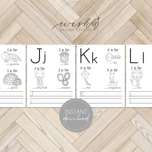 May include: Black and white printable alphabet flashcards for kids. Each card features a letter of the alphabet, a picture of an object that starts with that letter, and the word for the object. The words "I is for iguana", "J is for jam", "K is for key", and "L is for ladybug" are visible on the cards.