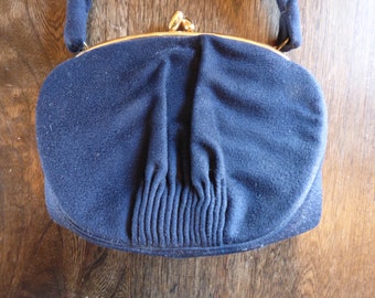 Dark Navy Blue and Gold Hand Bag . Very Clean . In Practically Perfect Shape! With Gold Chain Connected to Satin Coin Purse . Evening Bag