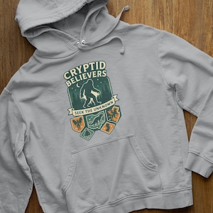 Folklore Legends Hoodie - Bigfoot, Mothman, Jersey Devil - Paranormal Cryptid Sweatshirt - Cozy Fleece Hoodie
