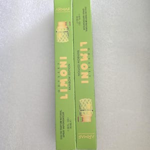 May include: Two green perfume boxes with the text "LIMONI" and "RAINBOW EDITION". The boxes also display the brand name "ARMAF" and the volume of the perfume, 1.18 fl oz / 35 ml.