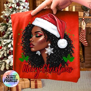 May include: Red Christmas-themed graphic featuring a woman with curly black hair, wearing a Santa hat and snowflake earrings. The words "Merry Christmas" are written in red script. The image has a festive holiday theme.