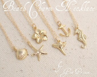 May include: Five gold necklaces with different beach-themed charms, including a seashell, starfish, plumeria flower, shark tooth, and anchor. The necklaces are on a beige fabric background. The text "Beach Charm Necklace" is written in cursive at the top of the image. The text "by Gem Passion" is written in cursive at the bottom of the image.
