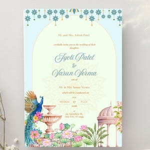May include: Wedding invitation with a light blue background and floral and peacock illustrations. The invitation includes the names Jyoti Patel & Varun Verma, and the date of the wedding.