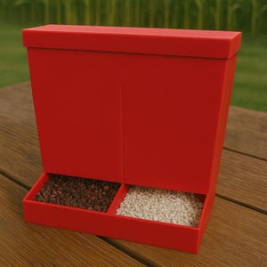 May include: A bright red pet food dispenser with two compartments. One compartment contains dark brown kibble, and the other contains light-colored kibble. The dispenser is made of a solid, rectangular material.