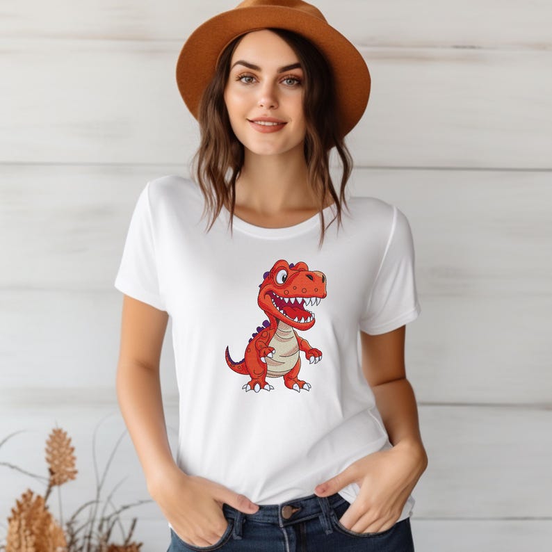 Woman wearing white t shirt with cartoon dinosaur embroidery design T rex machine embroidery pattern for kids clothing