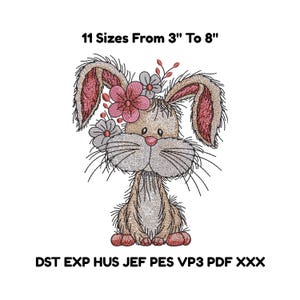 May include: An embroidered bunny design with a floral crown. The text above reads "11 Sizes From 7.6cm To 20.3cm". The bunny has long whiskers, a pink nose, and is in shades of tan, pink, and gray. The design is for embroidery.