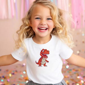 Smiling child wearing t shirt with cartoon dinosaur embroidery design T rex machine embroidery file for kids clothing