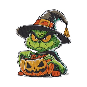 May include: An embroidered patch featuring a green, furry creature with yellow eyes wearing a black witch hat with an orange band and tassel. The creature is holding a carved orange jack-o'-lantern filled with small orange items, with two tiny pumpkins at the base.