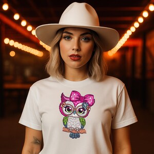 Woman wearing white t-shirt with Pink Bow Owl Embroidery Design – Cute Machine Embroidery Digital File for Hoop Sizes 3 to 8 Inches