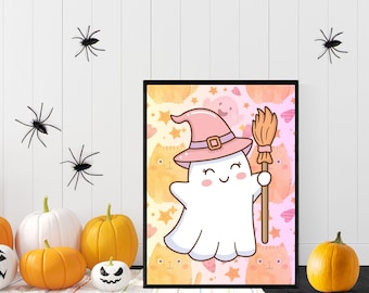 May include: A framed Halloween print with a cartoon ghost in a pink witch hat and holding a broom. The background has a pattern of cats, stars, and hearts. Pumpkins and spiders decorate the foreground.