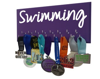 Swimming: Use a awards display rack to display your swimming awards