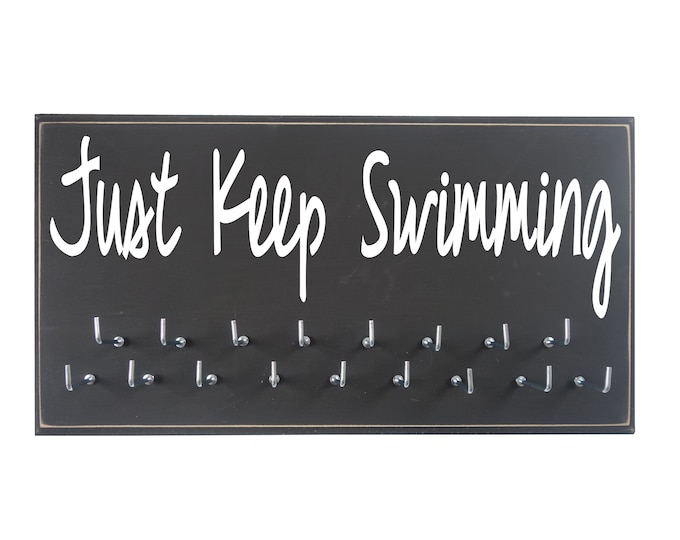 Swimming, just keep swimming, Just Keep Swimming, Use a awards display rack to display your swimming awards