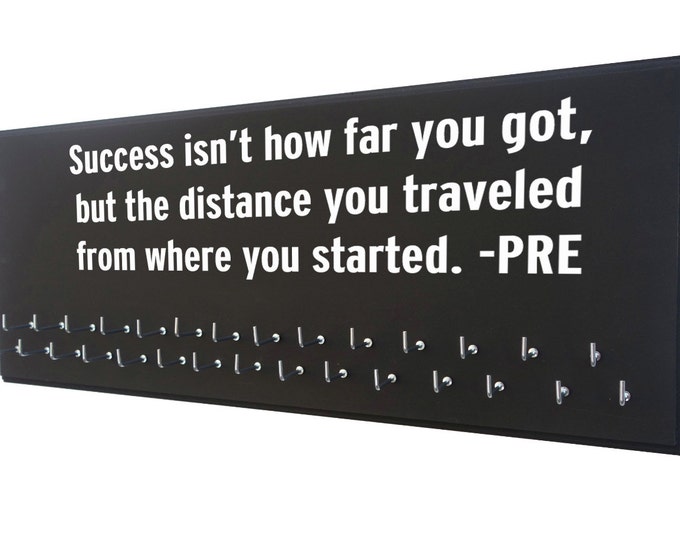 Running quotes, Running Medal display, Prefontaine, Success isn't how far you got, but the distance you traveled from where you started.