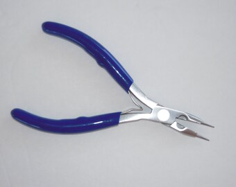May include: Blue handled pliers with a silver metal body and pointed tips.