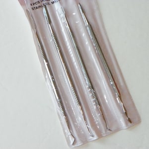 4-Piece Double-Ended Carving Tool Set With Two Cutting Blades