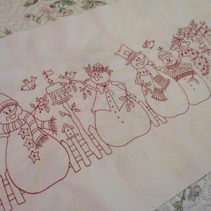 May include: A set of three ceramic mugs with a speckled, matte finish. The mugs are in shades of cream, light gray, and dark gray. Each mug has a simple, minimalist design, perfect for coffee or tea.