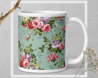 Taza de cerámica vintage con flores verdes y rosas