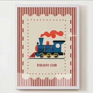 May include: Framed print featuring a blue train with red accents and orange smoke, set against a cream background. The print is bordered by a red and white striped pattern and includes the text "RAILWAY CLUB".