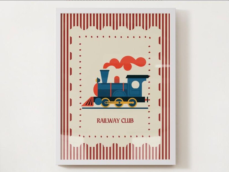 May include: Framed print featuring a blue train with red accents and orange smoke, set against a cream background. The print is bordered by a red and white striped pattern and includes the text "RAILWAY CLUB".