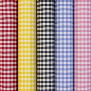 May include: Five vertical rolls of fabric featuring a classic gingham check pattern. The colors displayed from left to right are red, yellow, black, blue, and pink, each paired with white to create a consistent grid design across all textile bolts.
