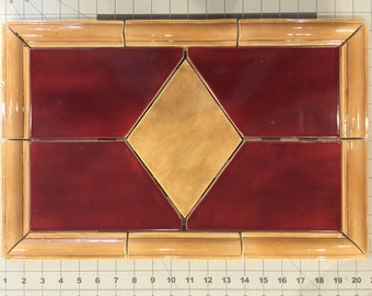 Backsplash cucina Tile inserire rosso e Tan da ceramiche simmetrico