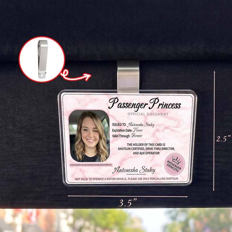 Puede incluir: Una tarjeta rectangular para parasol de coche Passenger Princess con foto, texto y clip met&aacute;lico. La tarjeta mide 8,89 cm de ancho y 6,35 cm de alto. El texto incluye "OFFICIAL DOCUMENT" y "Antonesha Staley."