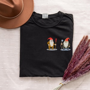 Wizard Duel T-Shirt – Two Wizards Facing Off Graphic Tee – Mystical Magic Shirt, Fantasy Witchcore Top, Cool Sorcerer Aesthetic