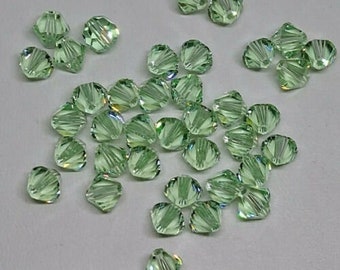 Swarovski Xilion cut Chrysolite 5 mm bicone crystal quantity 10