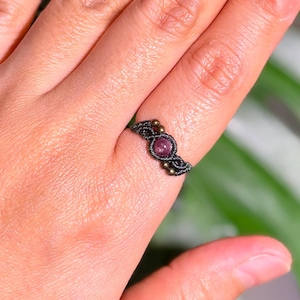 May include: A rustic wooden sign with the text "Welcome to our home" in white lettering. The sign features a distressed finish and a simple, inviting design, perfect for entryway decor.