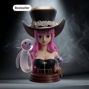May include: A bust of a character with pink hair, wearing a black top and a hat with roses. A translucent ghost and a small doll are on either side of the bust. The bust is on a wooden base. The word "Bestseller" is in the top left corner.