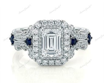 Anello di fidanzamento con moissanite 3/4, argento sterling placcato oro bianco 14 carati, con decorazione a volute e grana di miglio.