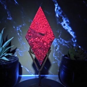 May include: A set of three ceramic mugs with a speckled, matte finish. The mugs are in shades of cream, light gray, and dark gray. Each mug has a simple, minimalist design, perfect for coffee or tea.