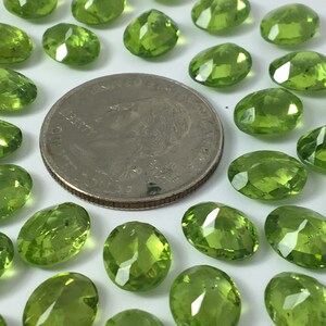 Peridot faceted ovals image 4