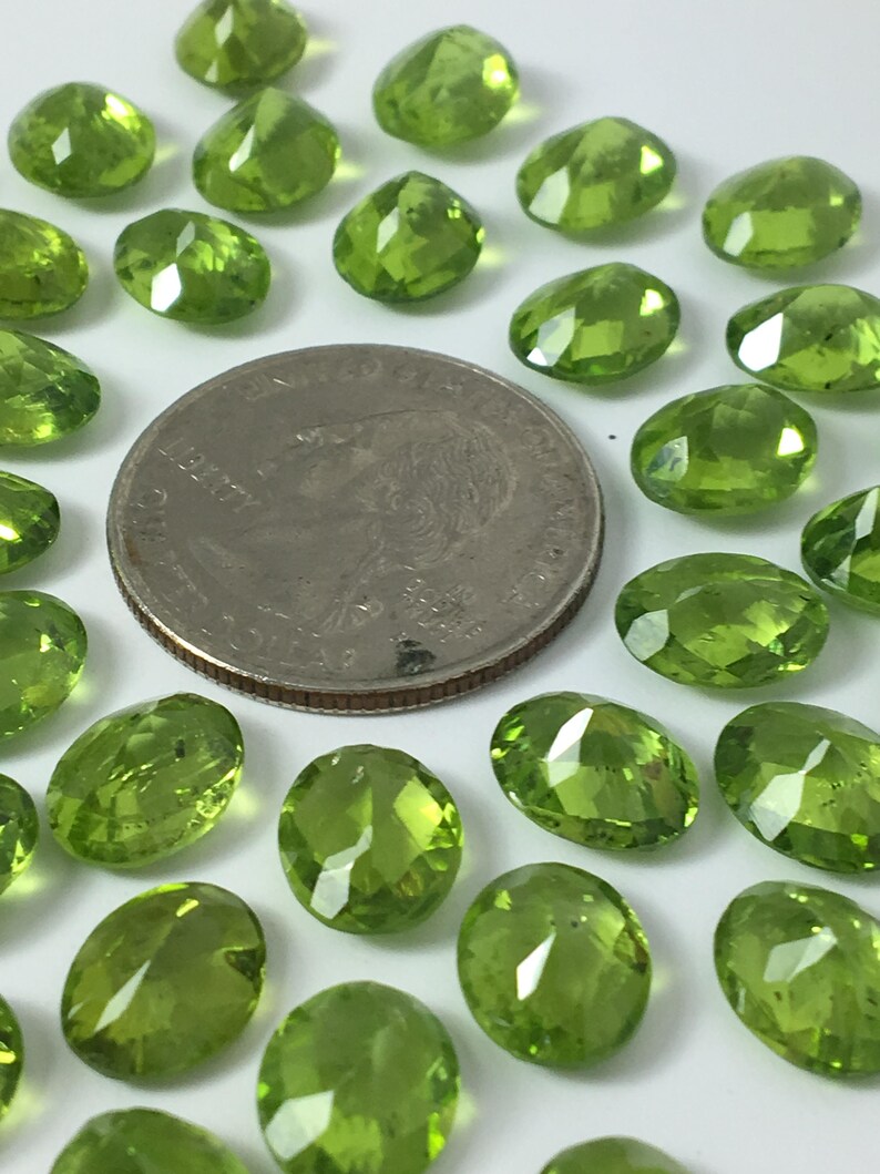 Peridot faceted ovals image 4