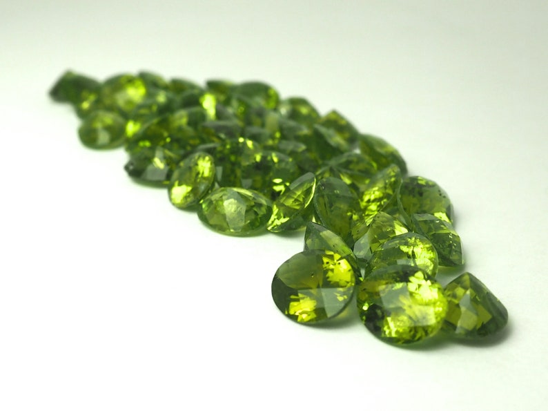 Peridot faceted ovals image 1