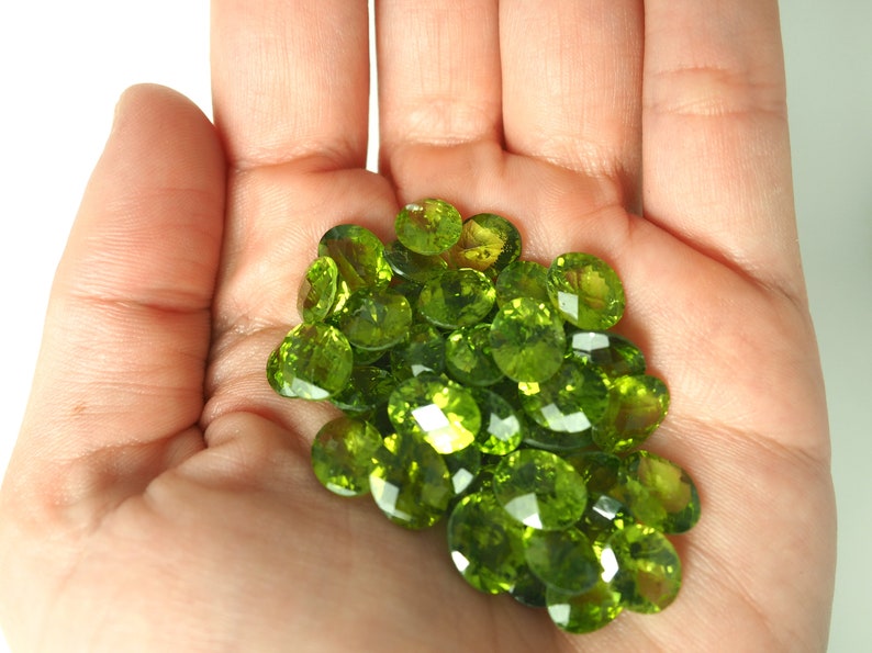 Peridot faceted ovals image 2