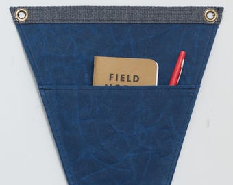 Waxed canvas pennant with storage pocket