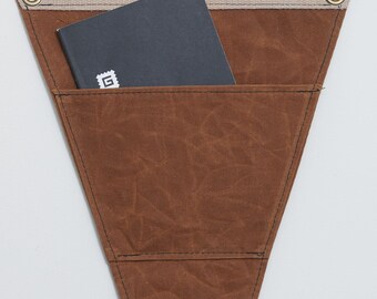 Waxed canvas pennant with storage pocket