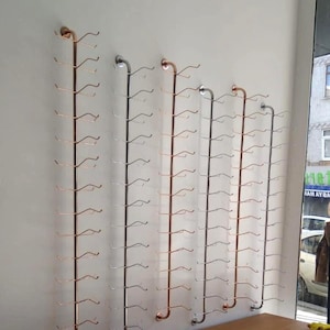Organizador de gafas de sol metálico de pared con 10 compartimentos