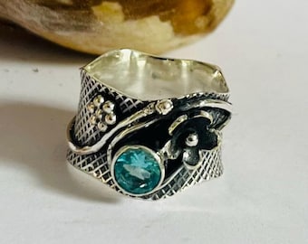Blue Topaz Ring: Sterling Silver Floral Band