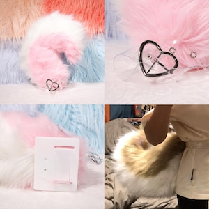 以下が含まれることがあります： ピンク、白、青のフェイクファーを組み合わせた、パステルカラーのふわふわの尻尾アクセサリー。 尻尾には、ハート型のディテールが付いた透明なプラスチック製のアタッチメントが付いています。 背景には、さまざまなカラフルなフェイクファーが表示されています。