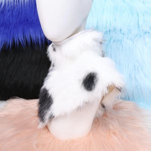 Soft handmade neck fur with cow-inspired patterning, blending cute and realistic animal styles. Its faux fur fibers are silky and long-lasting, while the inner lining offers breathability and smooth touch. Perfect for cosplay characters, mascots, or those who love cow-themed furry fashion accessories.