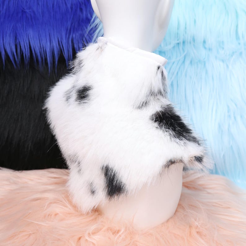 Adorable black and white cow pattern fursuit accessory that adds warmth and realism to your costume setup. Made with soft faux fur and breathable inner lining, this neck piece blends comfort with creative flair. A wonderful handmade gift for furries, cosplayers, or animal lovers who appreciate detailed craftsmanship.