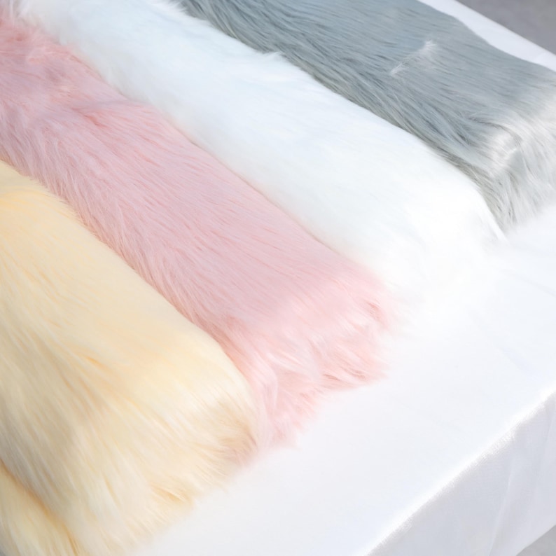 Lightweight faux fox fur with thick 2.36 inch pile, ideal for building fursuit accessories like tails, ears, and paws. The 45 × 85 cm size is perfect for cosplay crafts or plush toy enhancements. The soft synthetic fiber is beginner friendly and machine-sewable, offering the look and feel of real fur in a durable vegan material.